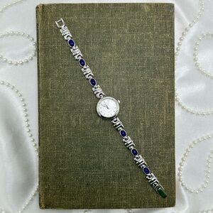 Silver Round Dial Watch with Blue Gemstone Band